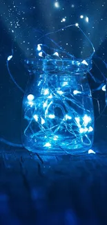 Mason jar filled with glowing blue lights on a dark wooden surface.