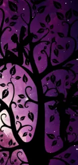 Silhouetted fairies on a tree with a purple starry background.