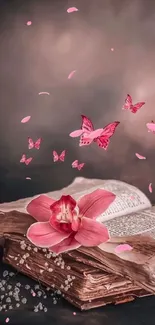 Open book with pink flowers and butterflies on a brown background.