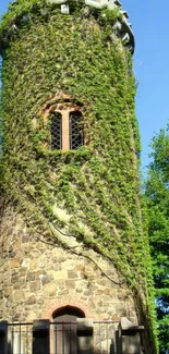 Ivy-covered stone tower with green foliage.
