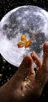 A hand releases a golden butterfly under a full moon surrounded by twinkling stars.