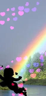 Double rainbow over green landscape with Cupid silhouette.