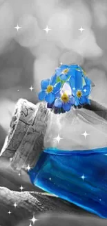 Blue liquid in a glass bottle with flowers on a mono background.