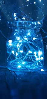 Enchanting glass jar with glowing blue fairy lights on display.