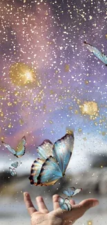 Surreal galaxy wallpaper with butterflies and golden accents in a cosmic scene.