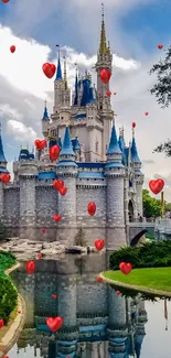 Fantasy castle with red heart balloons and blue sky.