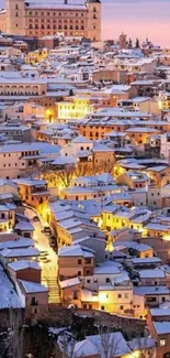 Snowy cityscape with purple sunset sky and glowing street lights.