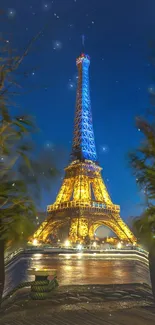 Enchanting night view of the Eiffel Tower in golden and blue hues against a starry sky.