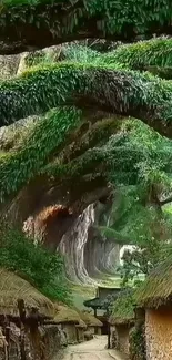 Scenic forest path through lush, green village with thatched cottages.