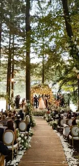 Outdoor forest wedding with floral decorations and seating.