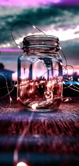 Glass jar with fairy lights against a twilight sky.