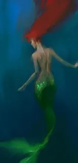 Fantasy underwater mermaid with red hair and a green tail swimming gracefully.