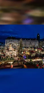 Vibrant night market scene with Christmas lights and a tall Christmas tree.