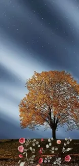 Lone tree under a starry night sky with flowers at the base.