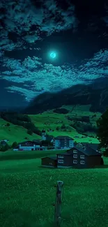 Moonlit valley with green hills and cloudy sky wallpaper.