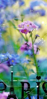 Vibrant Parisian floral wallpaper with pink and blue flowers against a natural background.