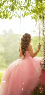 Woman in pink gown on a swing in a lush forest.