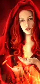 Mystical woman in red cloak with fiery elements on mobile wallpaper.