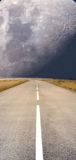 Road stretching to a giant moon in the night sky wallpaper.