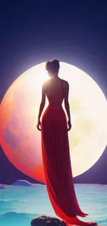 Silhouette in red dress standing before a glowing full moon under a dark blue sky.