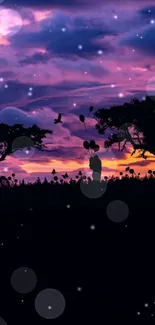 Silhouette of trees and person against a purple and pink sunset with stars.