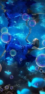 A mesmerizing underwater scene with a woman in a flowing blue dress surrounded by fish.