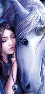 Fantasy art of girl and unicorn in a magical embrace.