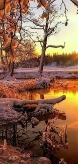 Golden winter sunset over a snowy landscape with reflective river.