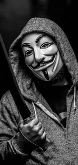 Black and white wallpaper of a person in a mask and hoodie holding a sword.