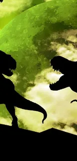 Silhouetted dinosaurs against a green night sky.