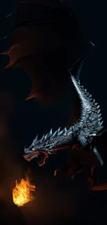 Majestic dragon breathing fire in the dark.