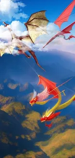 Dragons flying over mountains with clear blue skies in a fantasy wallpaper.