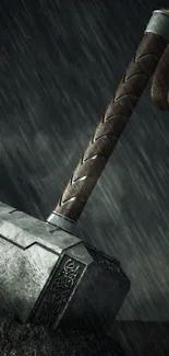 Epic dark wallpaper featuring a legendary hammer in a rainy scene.