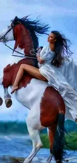 Epic scene of a rider on a horse by the ocean.