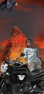 Rider on motorcycle with mountain and eagle in a vibrant sunset.