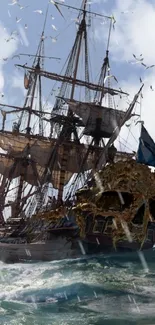 Pirate ship with skull bow sailing through ocean waves under a seagull-filled sky.