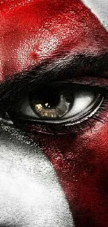 Close-up of a striking warrior eye with bold red paint.