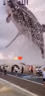 A giant shark leaps out of the ocean near a beach crowd.