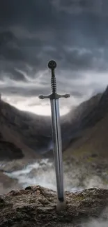 Sword stands in misty mountains under a dramatic sky.