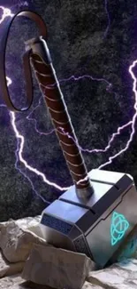 Epic hammer with lightning on a dark rock surface wallpaper.