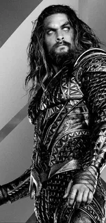 Epic warrior in detailed armor with trident in a striking monochrome image.