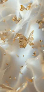 Ethereal gold butterflies in soft motion against a delicate background.