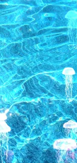 Ethereal jellyfish floating in vibrant aqua blue water, perfect mobile wallpaper.