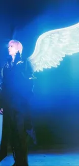 Person with neon angel wings in a dark blue setting.