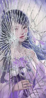 Ethereal portrait of a woman behind shattered glass in purple tones.