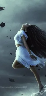 Woman in white dress amidst stormy sky and falling leaves.