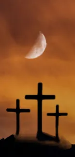 Silhouetted crosses under a sunset sky with a crescent moon.