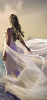 Woman in a flowing white dress with an ethereal backdrop.