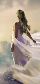 Woman in flowing white dress stands on a cliff, surrounded by clouds.