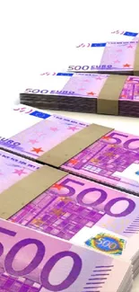 Stacks of 500 euro notes forming a vibrant and financial-themed wallpaper.